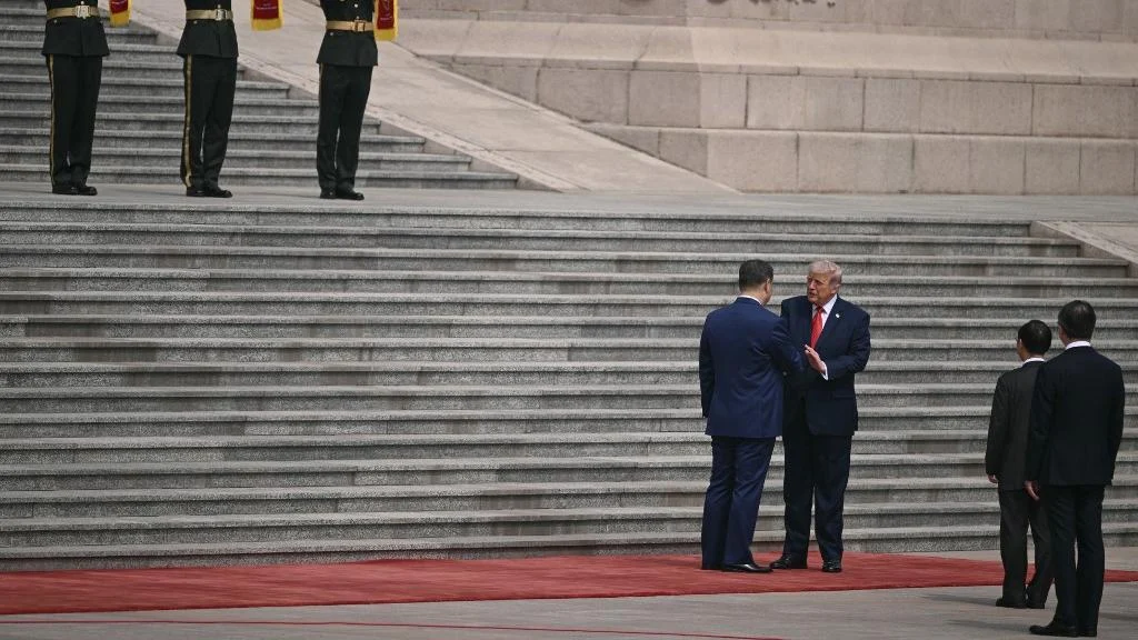 Trump dan Xi Jinping Bertemu di Beijing, Diawali Jabat Tangan